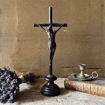 Antique Carved Corpus on Ebony Stand